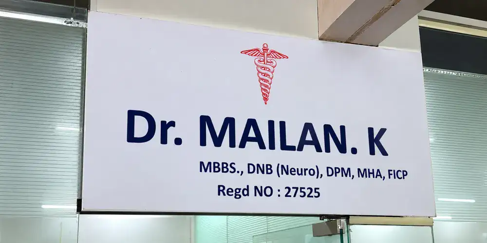 Nameboard reading Dr. Mailan K, MBBS, DNB (Neuro), DPM, MHA, FICP, Regd No 27525